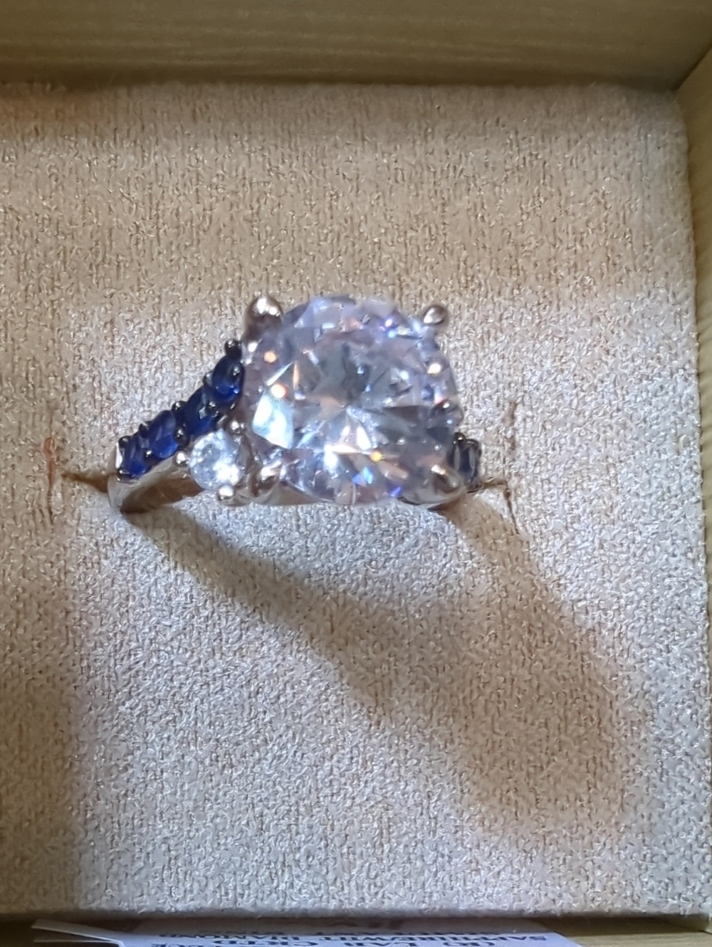 JTV Silver-Tone Ring with Clear Center and Blue Accent Stones